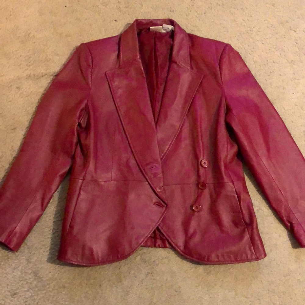 Dark red Newport News leather jackets .